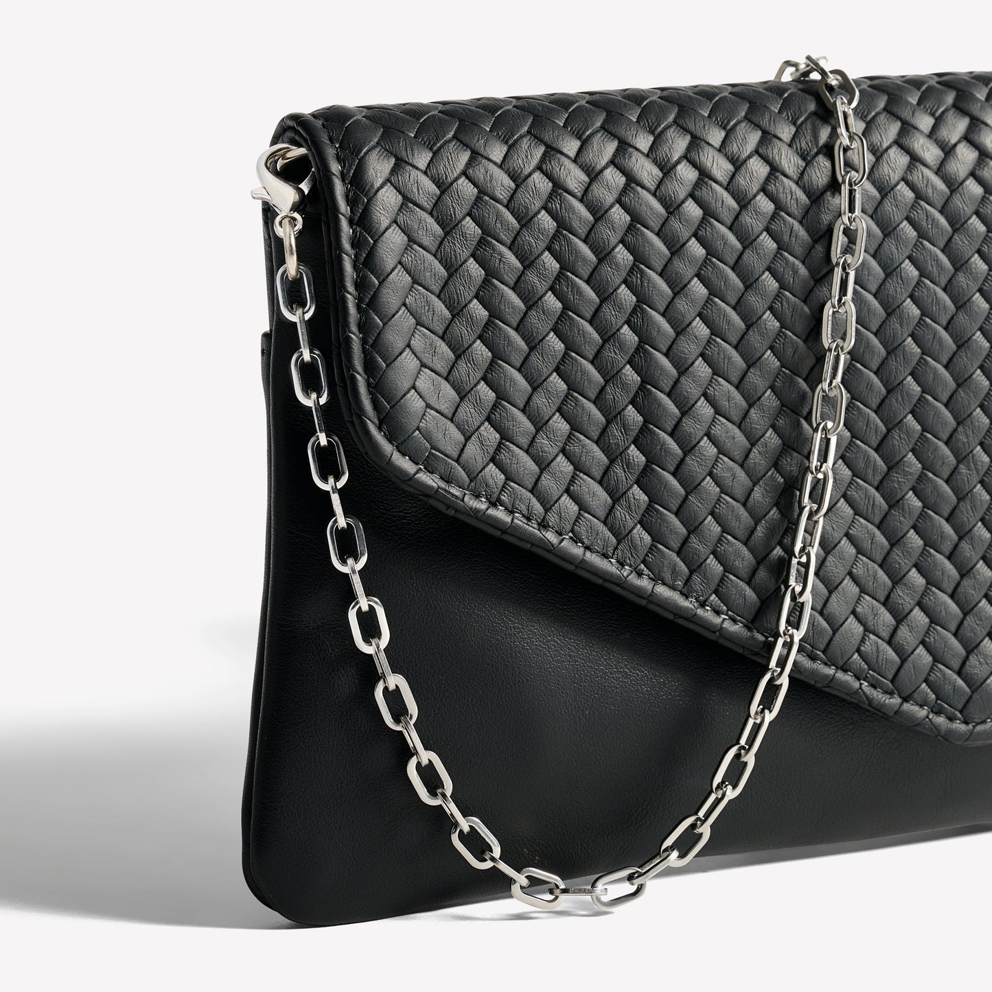 Comodo Envelope Clutch in Woven Black Soft Black Silver Hardware Close