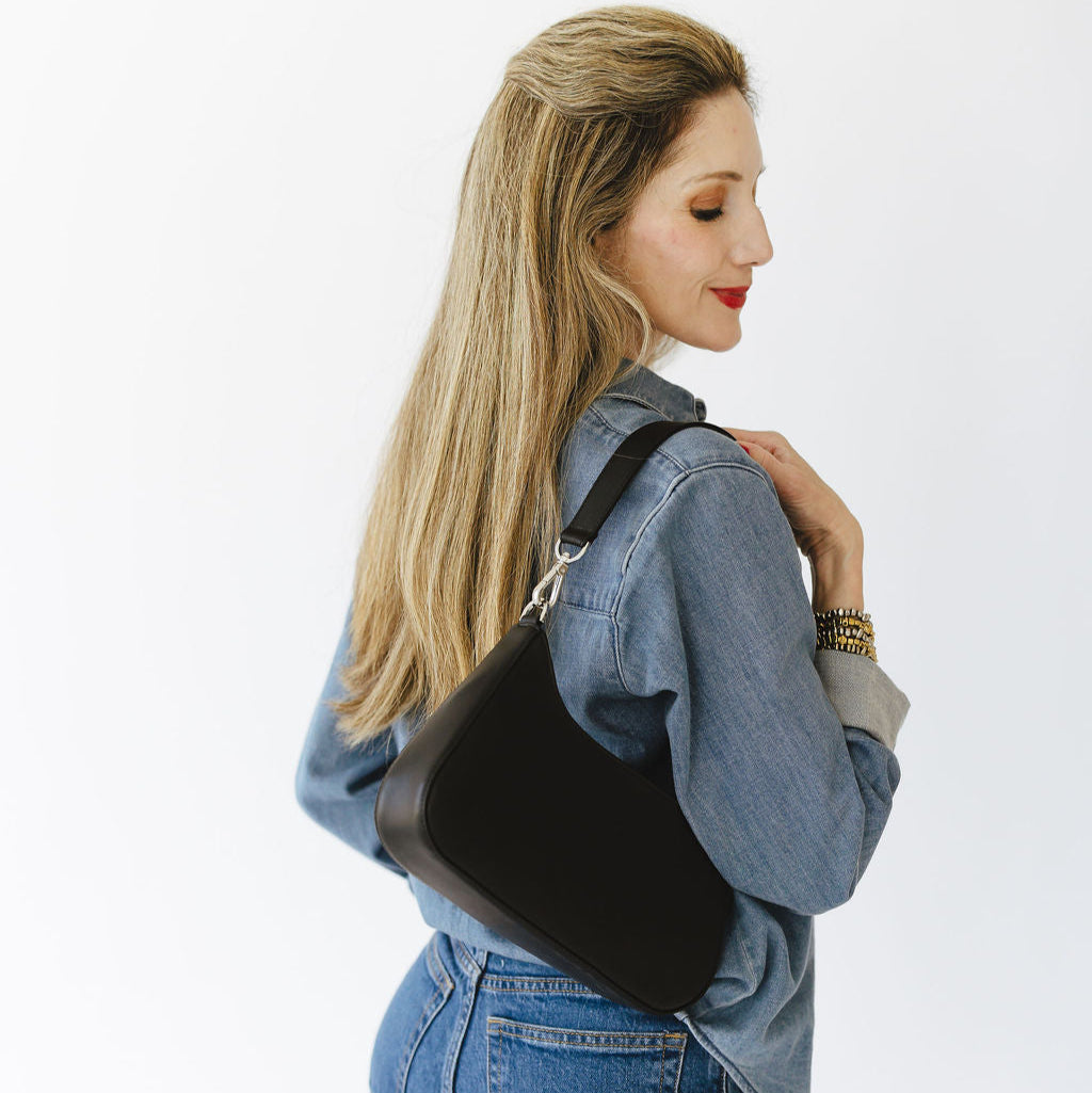 Harmony Shoulder Bag in Smooth Black with Silver Hardware Model on Shoulder