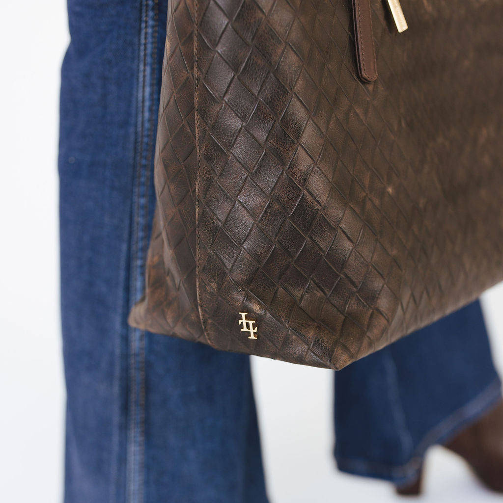 Opus Large Tote in Basketweave Brown Gold Hardware LL Logo Closeup