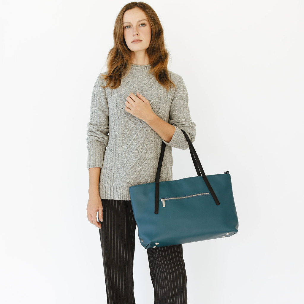Opus Medium Tote in Peacock/Black on models arm