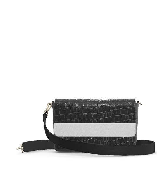 woman holding laudi vidni prima crossbody in embossed snake shadow and espresso leathers