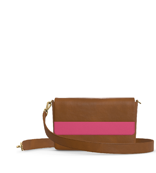 woman holding laudi vidni prima crossbody in embossed snake shadow and espresso leathers