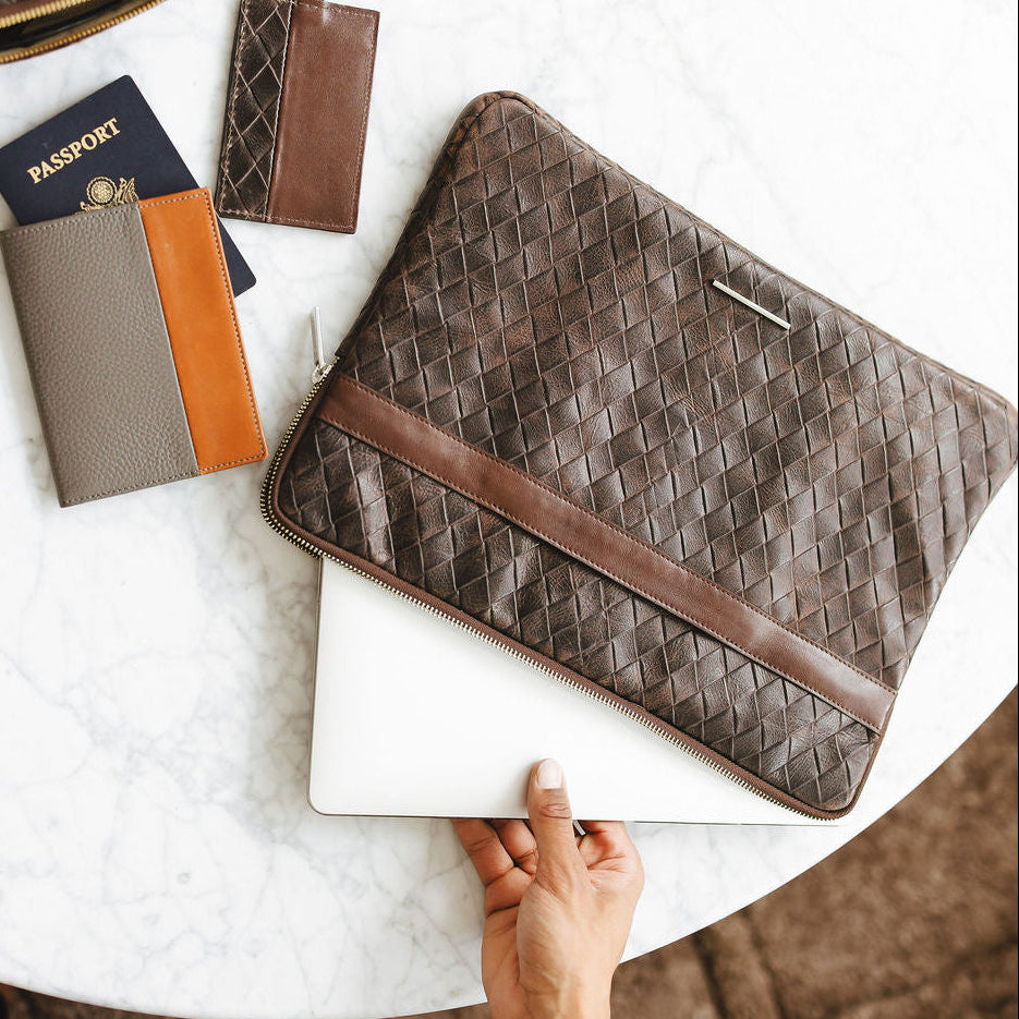 Adagio Laptop Sleeve in Basketweave Brown/Espresso on Table