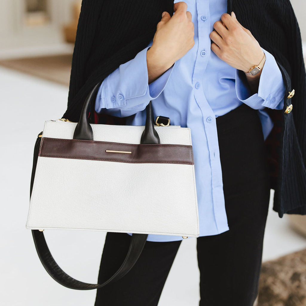 Courante Carryall Shoulder Bag in Savanna Stone Espresso Black on Model's Arm