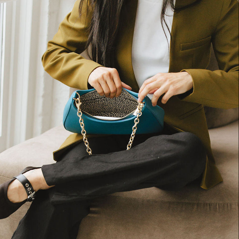 Harmony Shoulder Bag in Turquoise Model Showing Inside of Bag