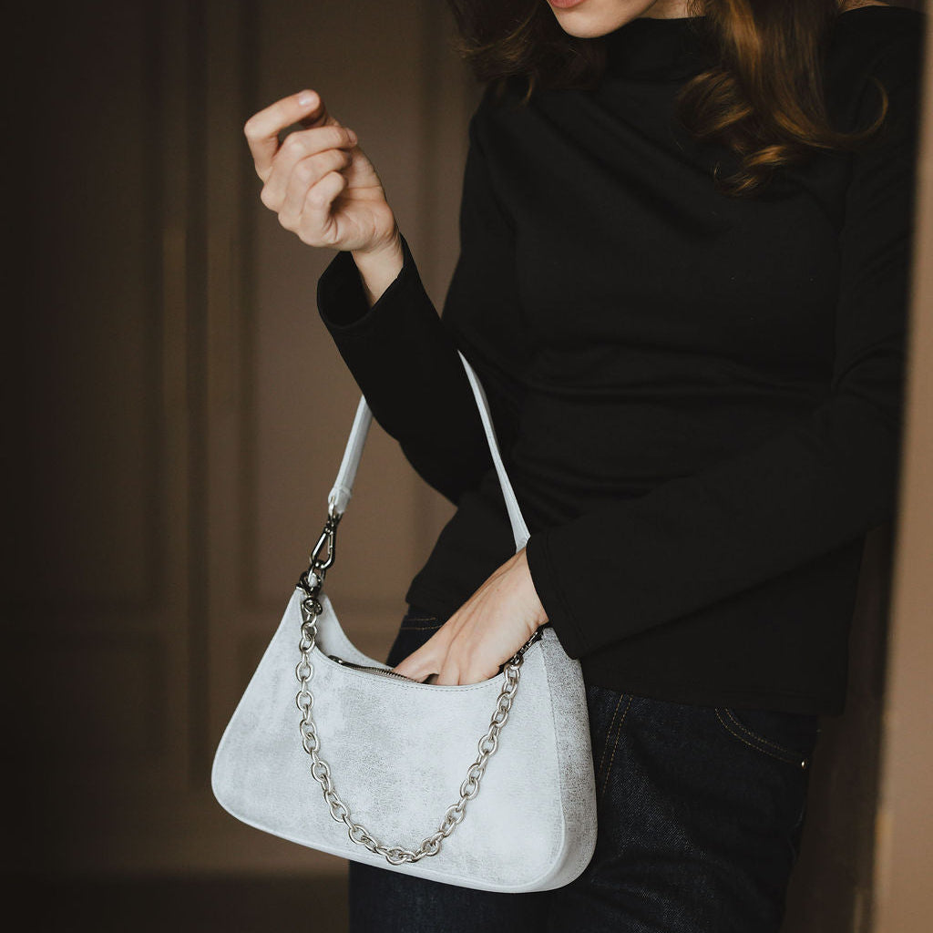 Harmony Shoulder Bag with Chain in Distressed Metallic Silver on Model's Arm