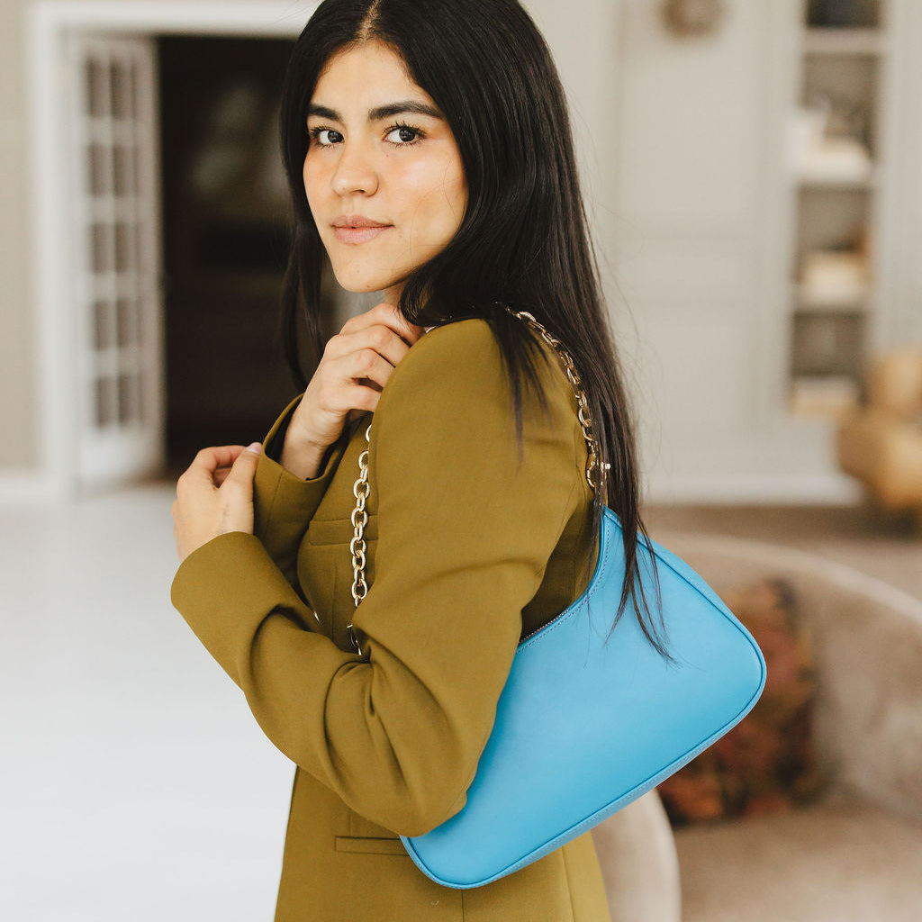 Harmony Shoulder Bag with Chain in Turquoise On Model Shoulder 