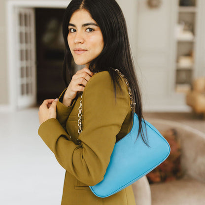 Harmony Shoulder Bag with Chain in Turquoise On Model Shoulder 