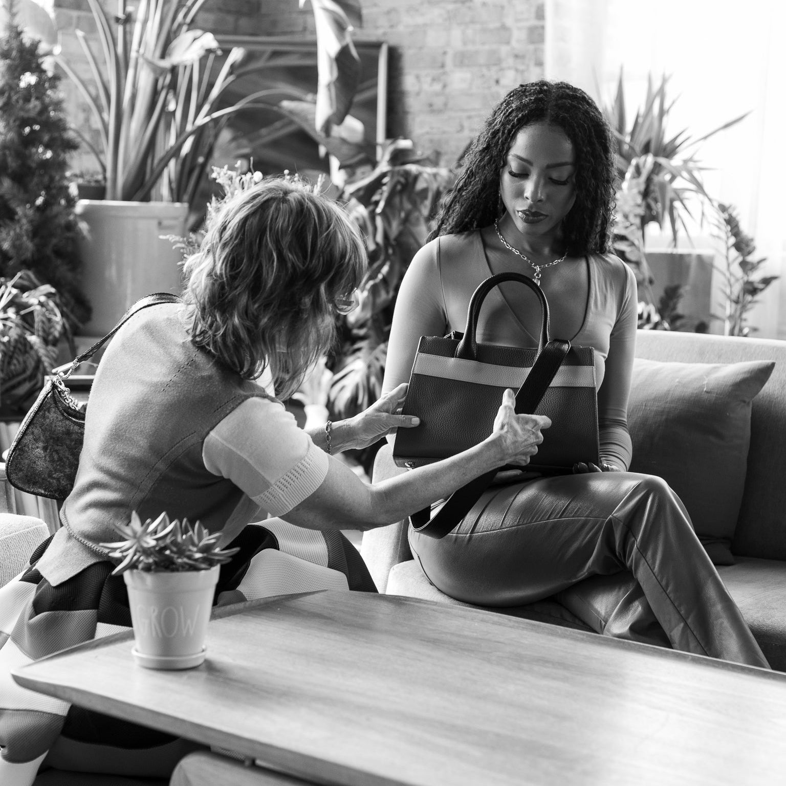 Laura and model with courante crossbody bag