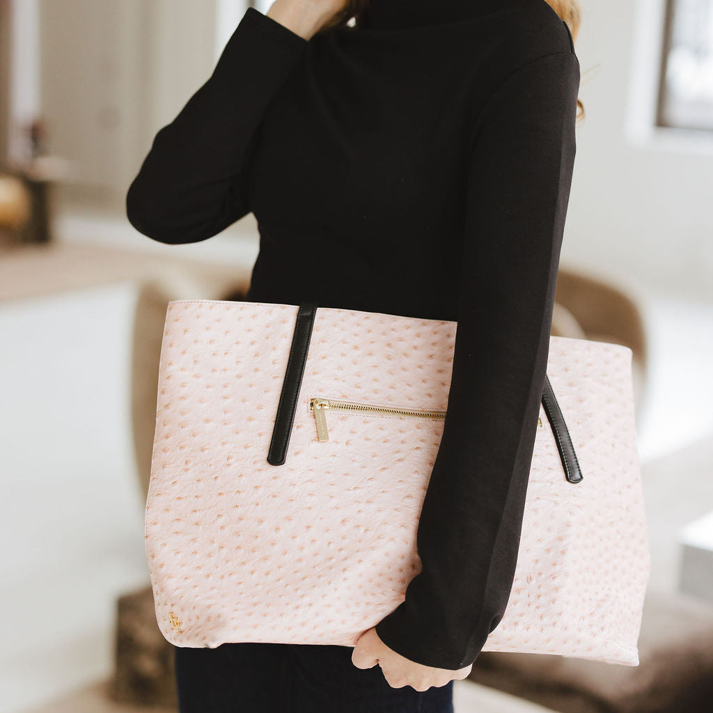 Opus Large Tote in Embossed Ostrich Pink and Black Model Holding