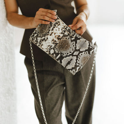 Vivace Crossbody with Chain in Embossed Snake Shadow Model Opening