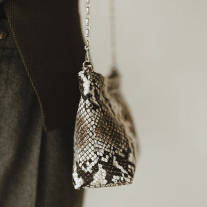 Vivace Crossbody with Chain in Embossed Snake Shadow Side View on Model